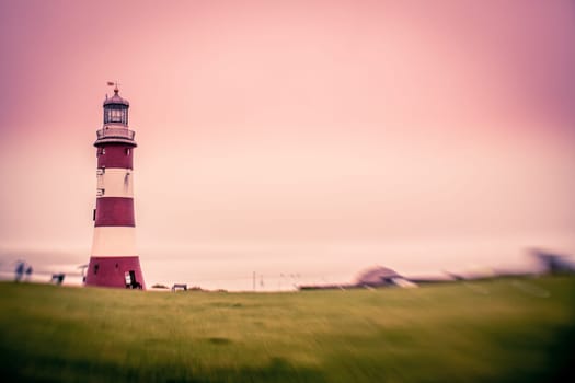 Lighthouse in Plymouth harbour on a rainy day, Devon, England