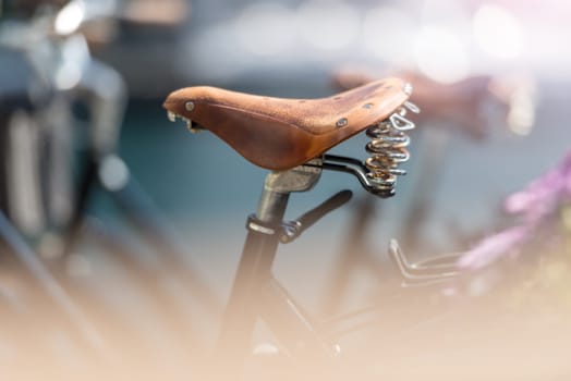 Bicycle saddle close up in street of Alesund, Norway, Scandinavia, Europe. Active lifestyle, city transportation.