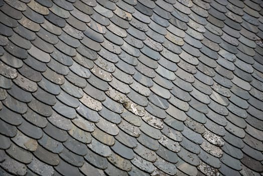 Old tiled roof. Top of building. Architecture of Norway, Scandinavia, Europe.