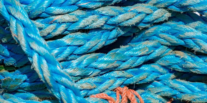 Detail view on ropes on boat in port of Norway, Scandinavia, Europe.