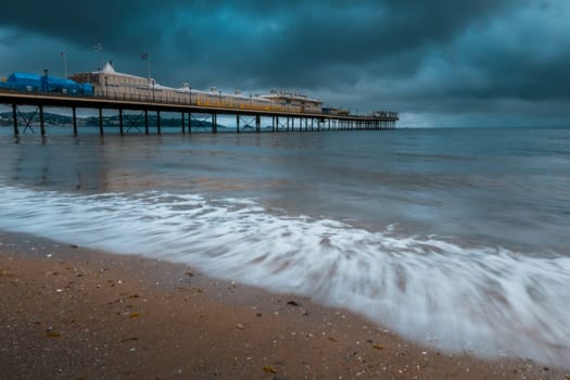 Pier on Paignton beach near Torquay in Devon on a stormy day