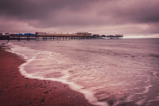 Pier on Paignton beach near Torquay in Devon on a stormy day