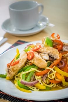 Oriental grilled chicken meal vegetables and noodles