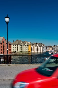 Alesund, Norway view of central city part with historic art nouveau architectural style in which most of the town was rebuilt after a fire in 1904. Popular tourist destination in Scandinavia, Europe.