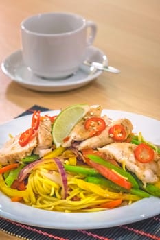 Oriental grilled chicken meal vegetables and noodles