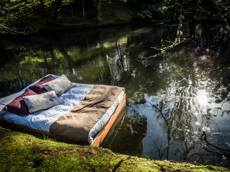 Double bed floating on the surface of a small lake in The Terra Nostra Garden in furnas,  on Sao Miguel island, Azores, Portugal