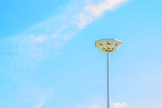 Light pole in the blue sky