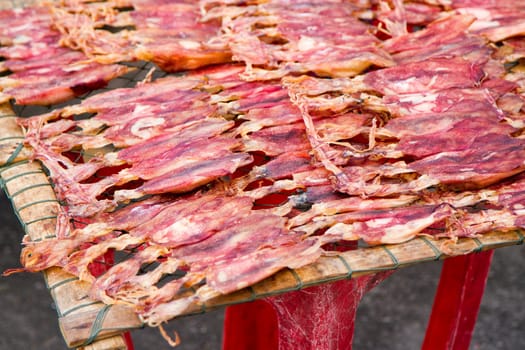 Dried red squid Sun on the grid