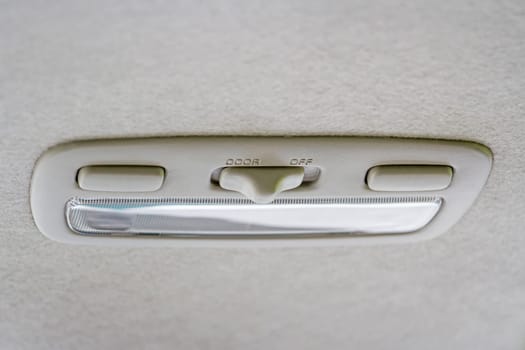 Switch lights in the cabin color cream.