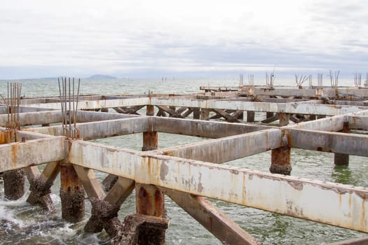 Pillars of cement in the sea.