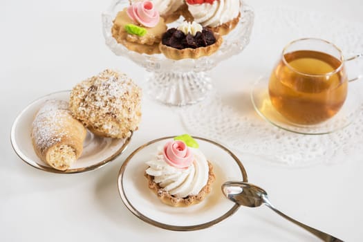 Tasty different cakes set with on a white background