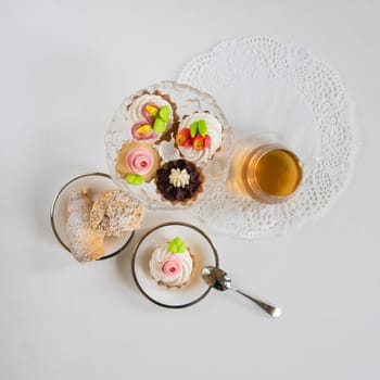 Tasty different cakes set with on a white background