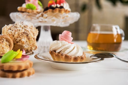 Tasty different cakes set with on a white background