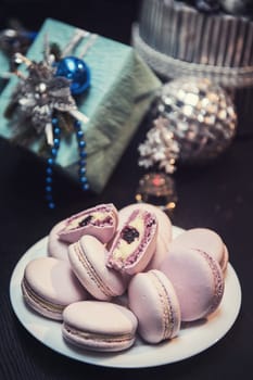 Macaroons cookies on new year background