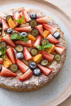 Sweet summer bright cakes with fruit and berries