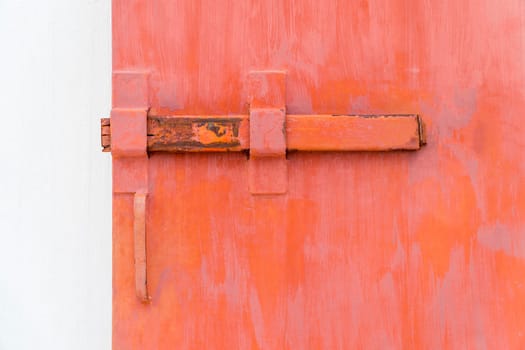Red door with bolt with white background
