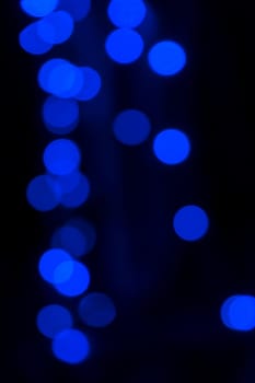 Blue bokeh vertical for background and artwork.