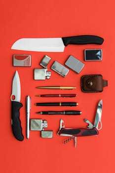 Male gifts on a orange background, flat lay
