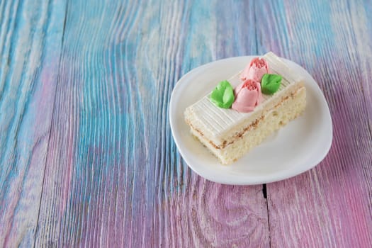 Tasty mini cake on a color gradient background
