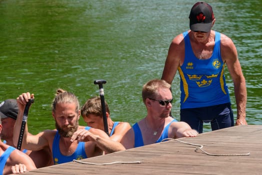 Rome, Italy - July 30, 2016: Dragon boat crews  compete at the european championships held in Italy in 2016 summer, Sverige team