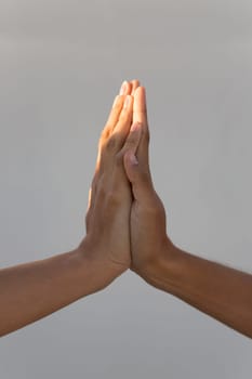 Two hand areas on top of each other