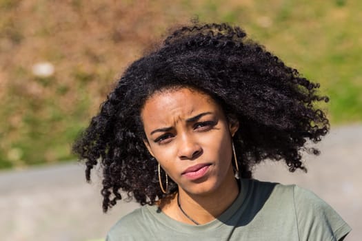 Portrait of an attractive African-American woman. Outdoor Shooting.