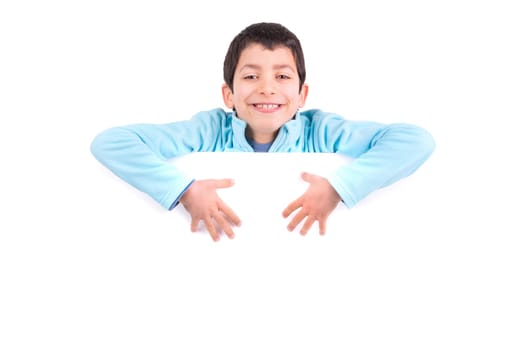 Young boy posing with a white board