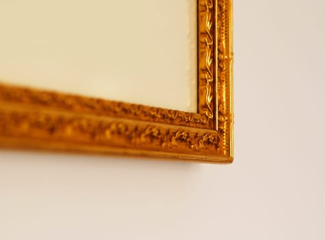 detail of the corner of a golden frame