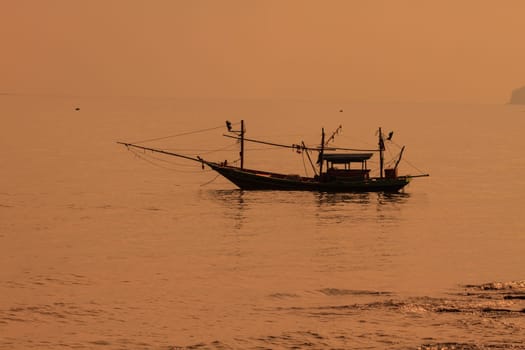 Fishing boat on the sea in summer