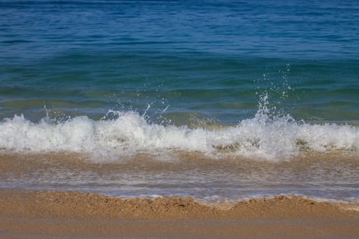 Moving of surf in the sea,Soft wave of the sea on the sandy beach