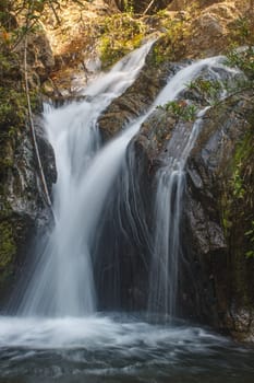 Thor Thip waterfall in thai national park.waterfall in the deep forest on mountain
