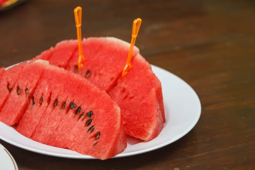 Colorful Thai fresh fruit on ceramic plate