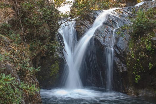 Thor Thip waterfall in thai national park.waterfall in the deep forest on mountain