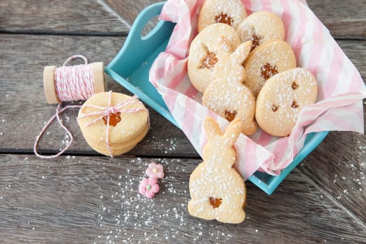 Folded places with jam and icing sugar for Easter