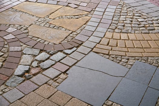 Footpath made of various materials in the city center of Magdeburg