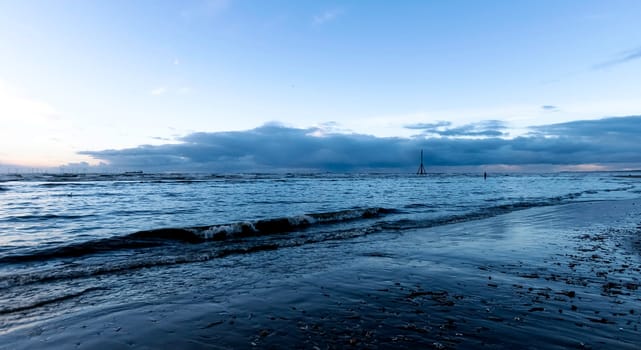 Sunset on Crosby Beach in winter - Crosby, Liverpool, United Kingdom