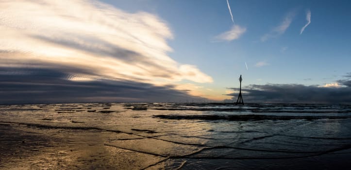 Sunset on Crosby Beach in winter - Crosby, Liverpool, United Kingdom