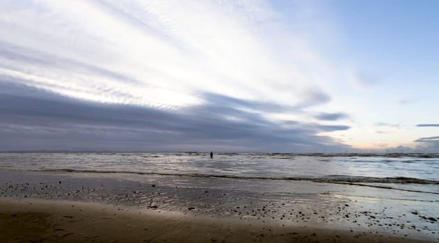 Sunset on Crosby Beach in winter - Crosby, Liverpool, United Kingdom