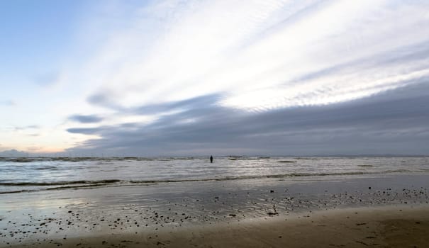 Sunset on Crosby Beach in winter - Crosby, Liverpool, United Kingdom