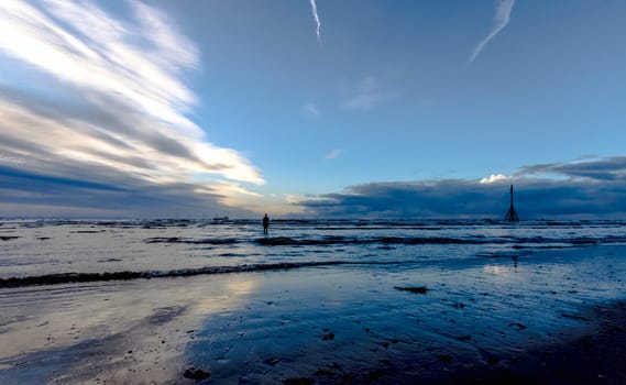 Sunset on Crosby Beach in winter - Crosby, Liverpool, United Kingdom