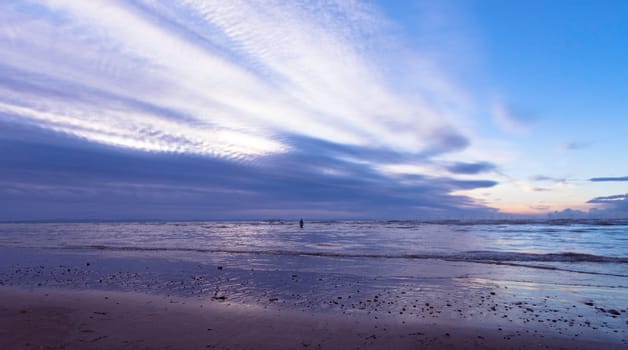 Sunset on Crosby Beach in winter - Crosby, Liverpool, United Kingdom