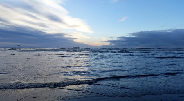 Sunset on Crosby Beach in winter - Crosby, Liverpool, United Kingdom