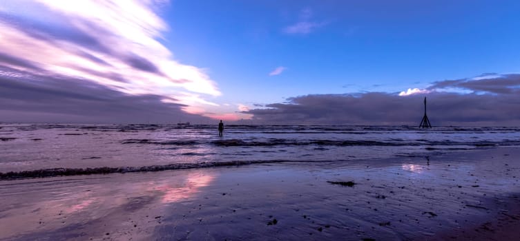 Sunset on Crosby Beach in winter - Crosby, Liverpool, United Kingdom