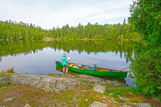 Plotting Your Course into the Wilderness on Ottertrack Lake in the Boundary Waters in Minnesota