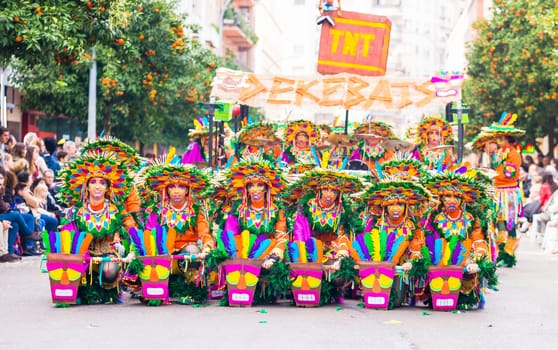 Badajoz, Spain, sunday. February.26. 2017 Participants in colorful costumes take part in the carnival parade in Badajoz 2017