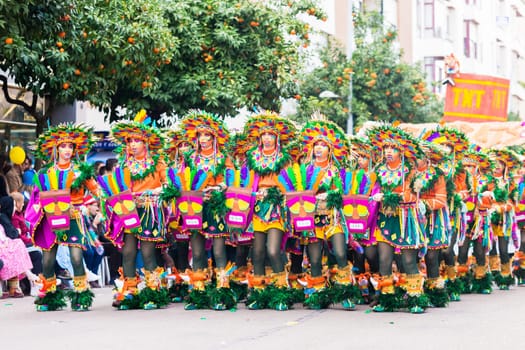 Badajoz, Spain, sunday. February.26. 2017 Participants in colorful costumes take part in the carnival parade in Badajoz 2017