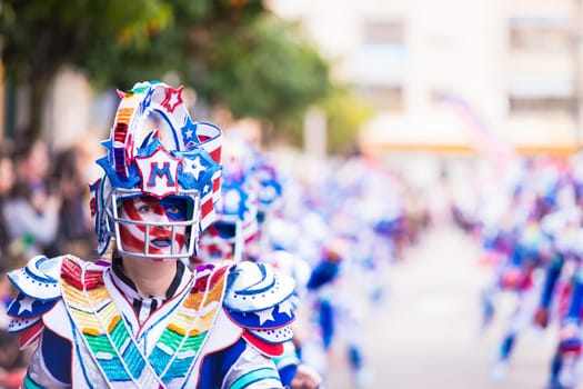 Badajoz, Spain, sunday. February.26. 2017 Participants in colorful costumes take part in the carnival parade in Badajoz 2017