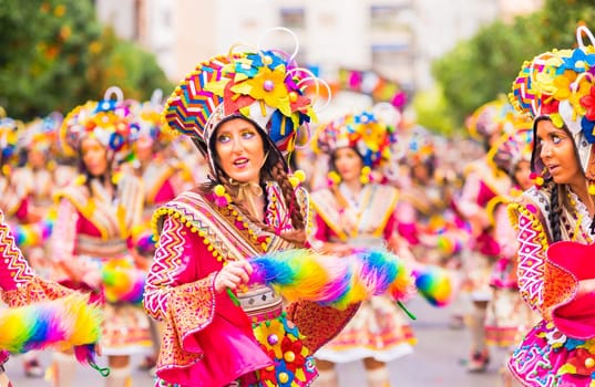 Badajoz, Spain, sunday. February.26. 2017 Participants in colorful costumes take part in the carnival parade in Badajoz 2017