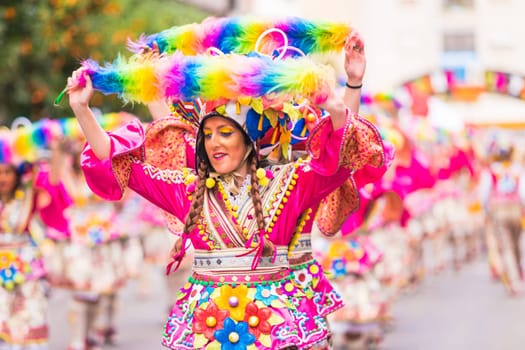 Badajoz, Spain, sunday. February.26. 2017 Participants in colorful costumes take part in the carnival parade in Badajoz 2017