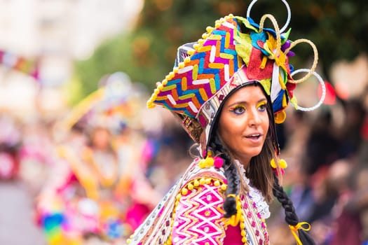 Badajoz, Spain, sunday. February.26. 2017 Participants in colorful costumes take part in the carnival parade in Badajoz 2017